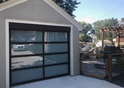 modern, glass garage door, modern home, modern garage, full view, all glass